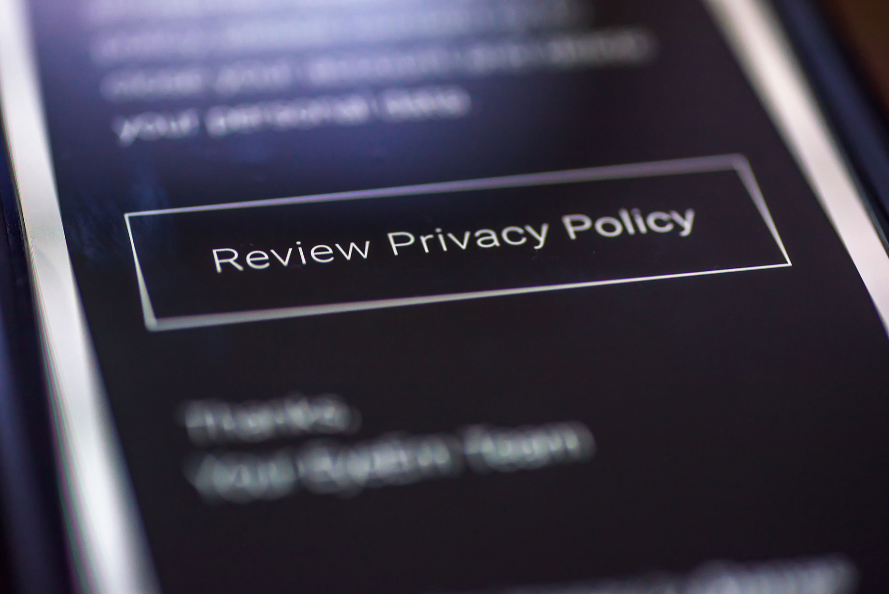General Data Protection Regulation - GDPR - closeup smartphone message with button Review Privacy Policy.
